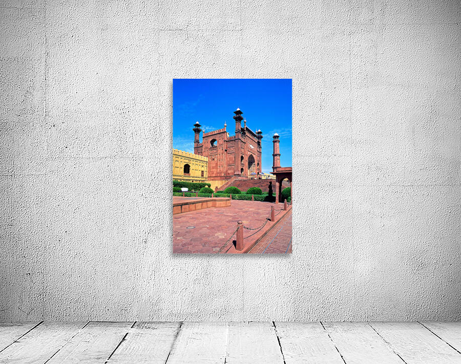 Mosque stands tall in Lahore with clear blue sky above Wall Preview