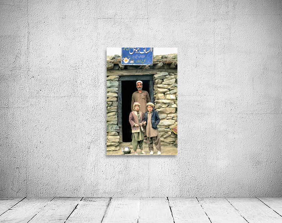 Family near shop at Shandur Pass in Pakistan Wall Preview