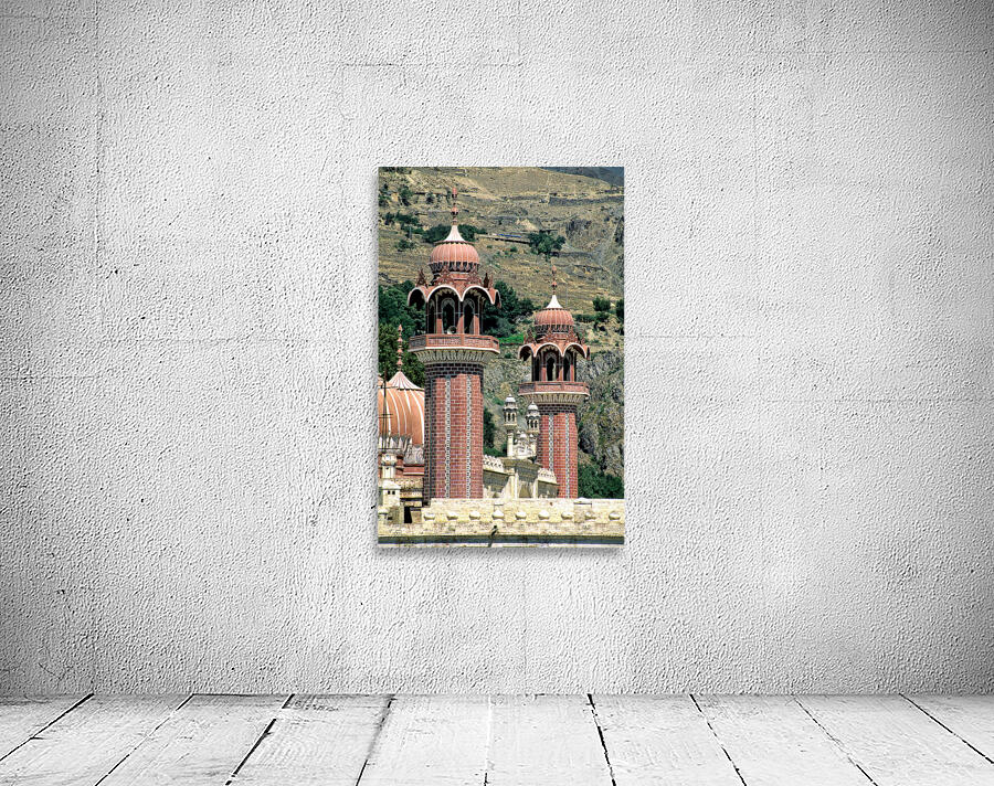 Mosque towers stand tall in Chitral Pakistan on a clear day Wall Preview