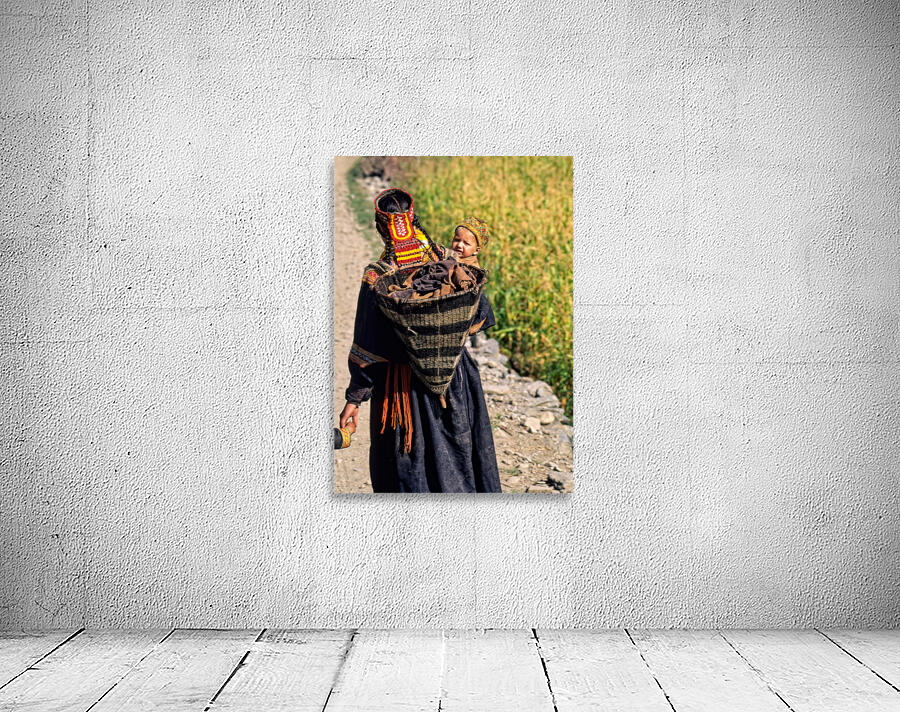 Life in kalash village of bumburet valley with a child Wall Preview