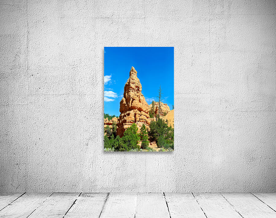 Rock formation towers over trees in Dixie National Forest Wall Preview
