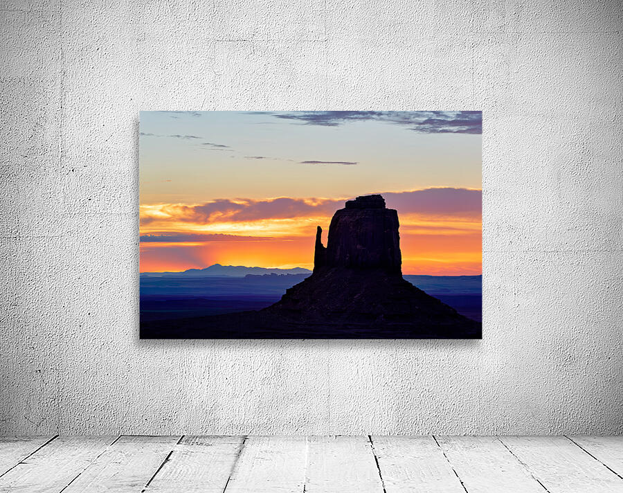 Sunset view over Monument Valley in Utah with dark silhouettes Wall Preview