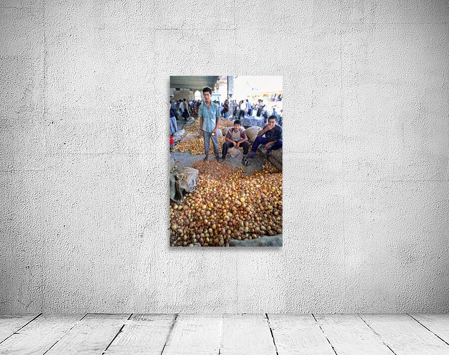 Young vendors sell onions in a market in Khiva Uzbekistan Wall Preview