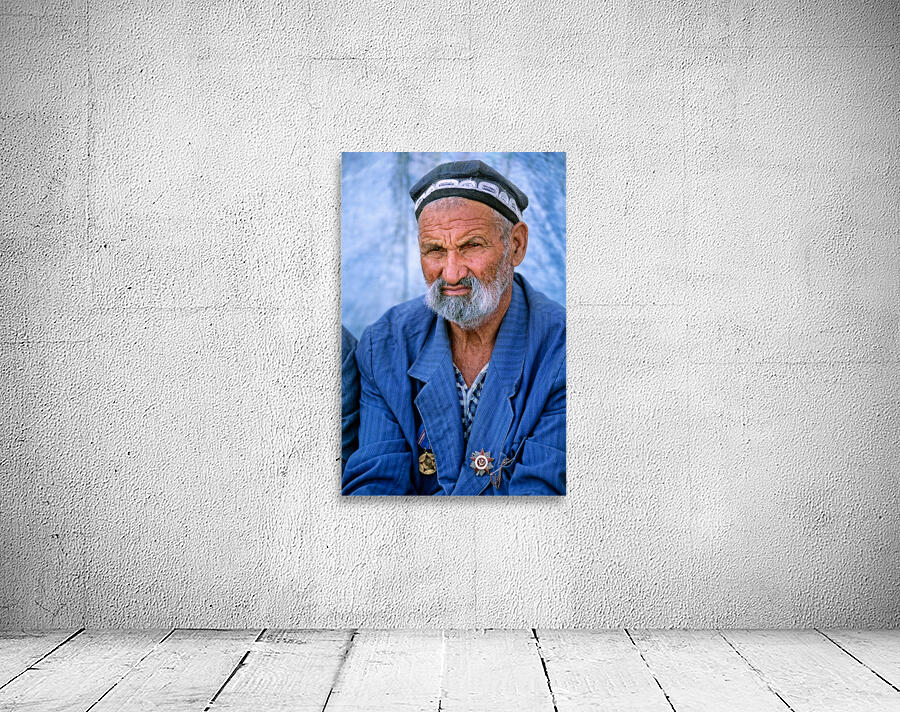 Elderly man in Bukhara Uzbekistan engages in local culture Wall Preview