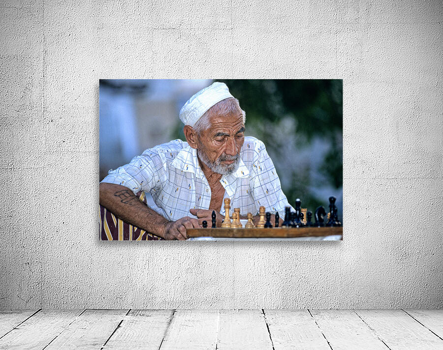 Elderly man plays chess in Bukhara Uzbekistan Wall Preview