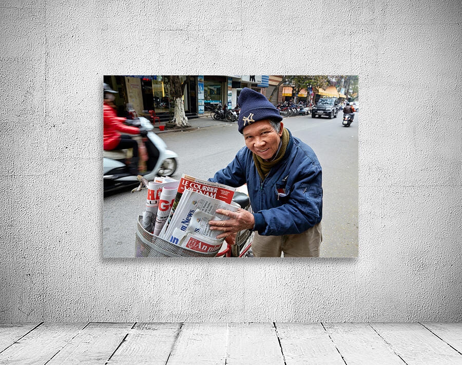 Man selling newspapers in Ho Chi Minh City Wall Preview