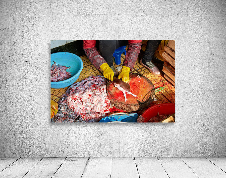 Market activity in Hanoi with fish preparation in progress Wall Preview