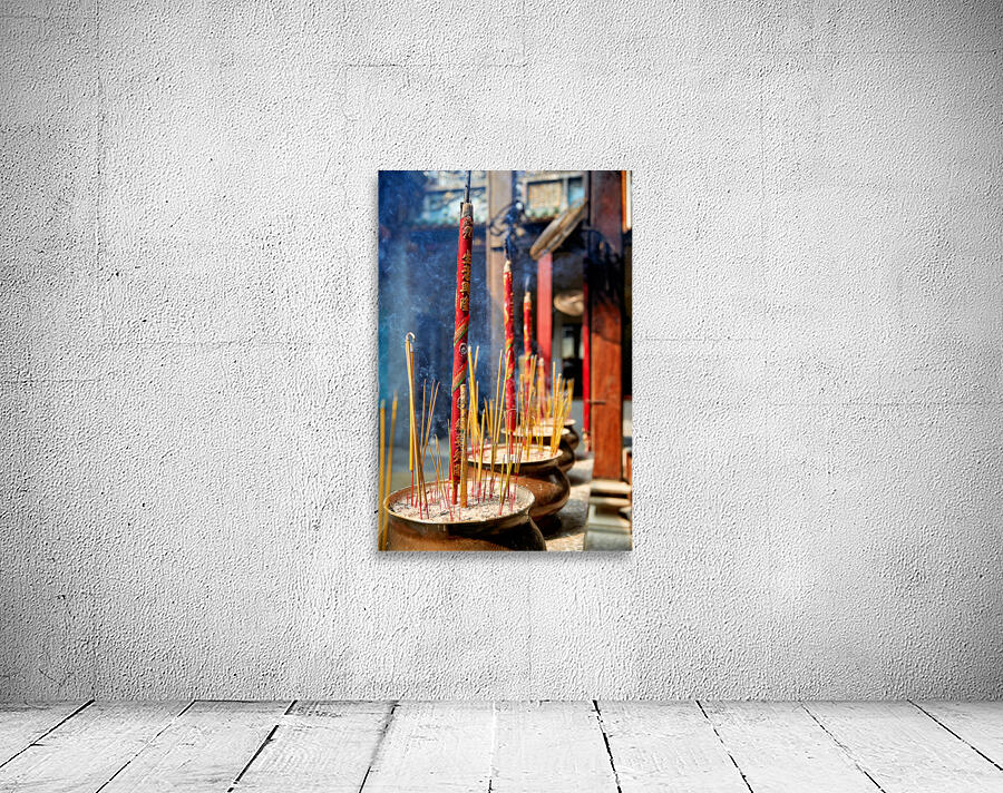 Incense sticks burning at a temple in Ho Chi Minh City Wall Preview