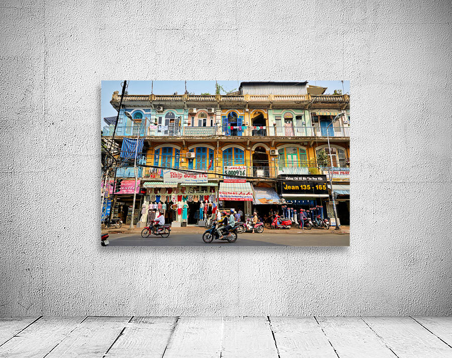 Shopping in Ho Chi Minh City streets during a sunny day Wall Preview