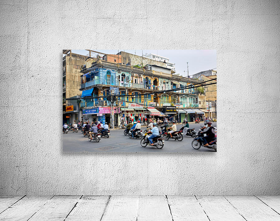Busy street scene in Ho Chi Minh City with motorbikes and shops Wall Preview