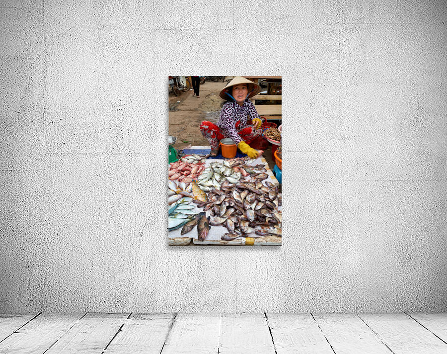 Fish seller in Phu Quoc market shows fresh catch for sale Wall Preview