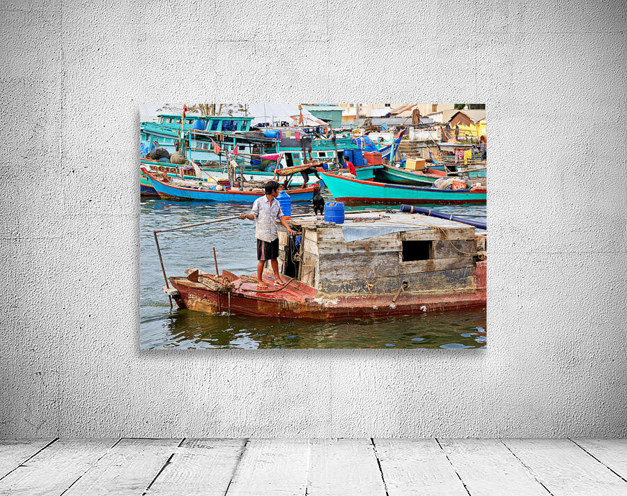 Fishing boat on water in Phu Quoc Vietnam during the day Wall Preview
