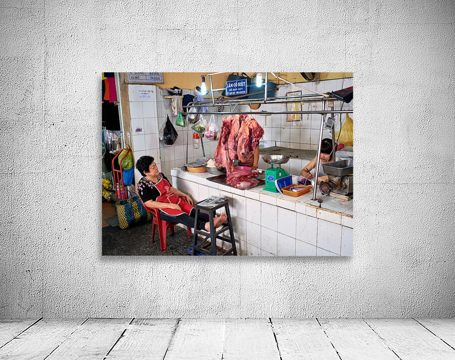 Market scene in Ho Chi Minh City with meat vendor and customer Wall Preview
