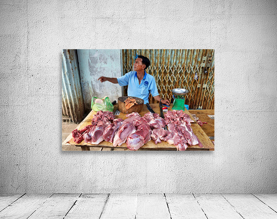 Local butcher selling meat in Phu Quoc market area Wall Preview