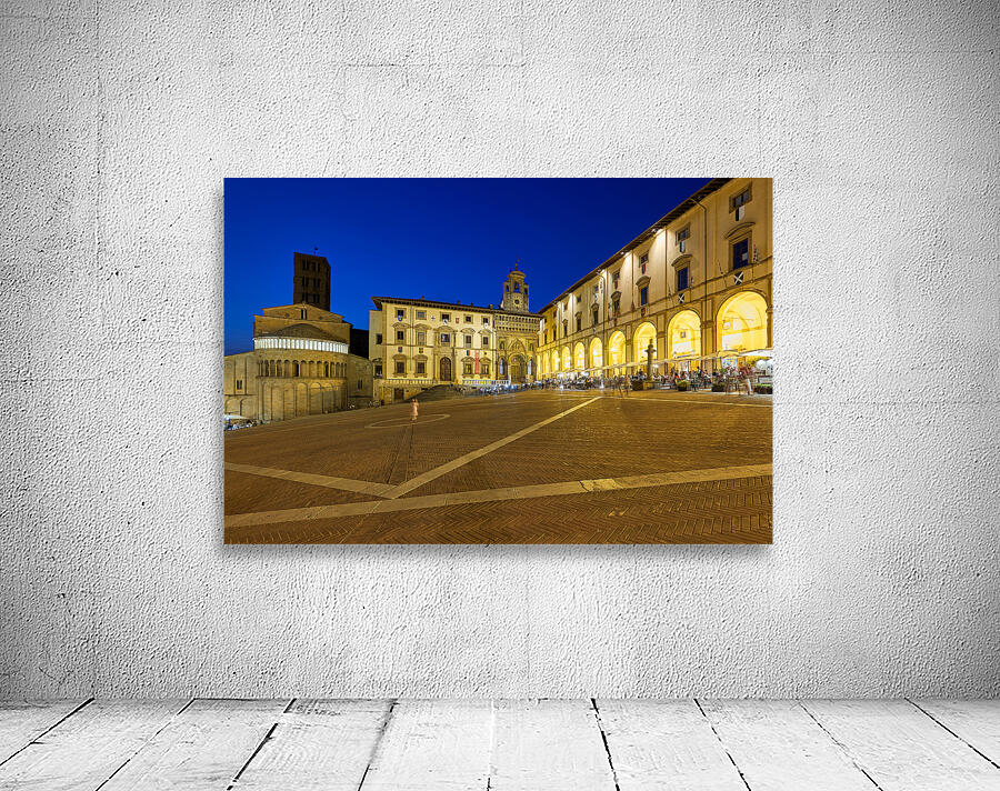Piazza Grande in Arezzo at sunset with glowing architecture Wall Preview