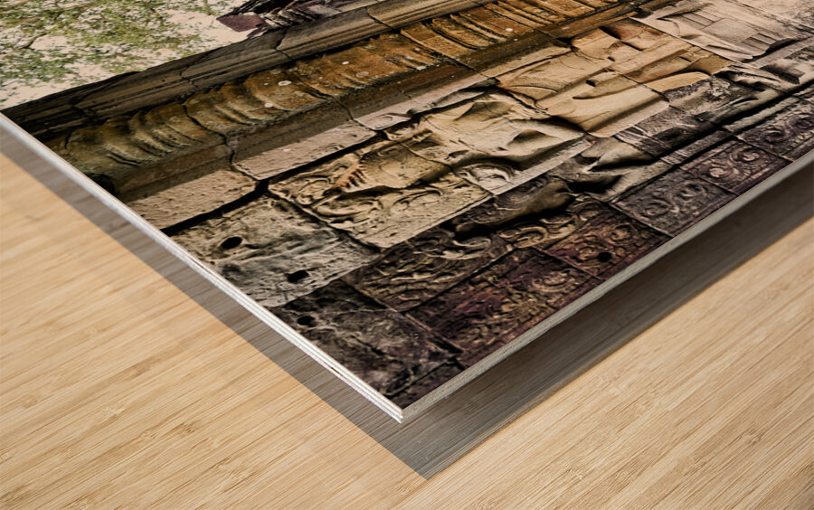 Statues at the entrance of the jungle temples of Ta Prohm. Siem Reap. Cambodia Wood print