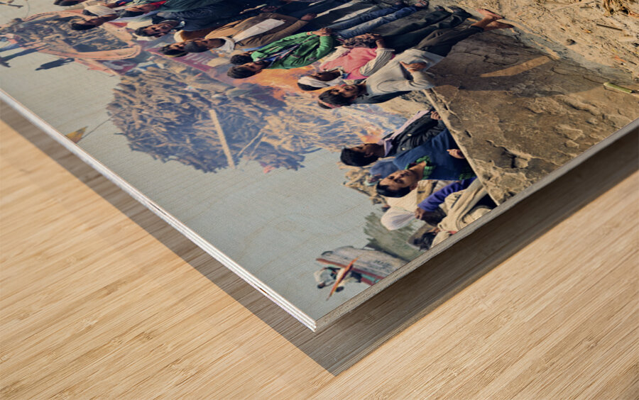 India. Varanasi Benares Uttar Pradesh. The sacred rite of hindu cremations by the river Ganges Wood print