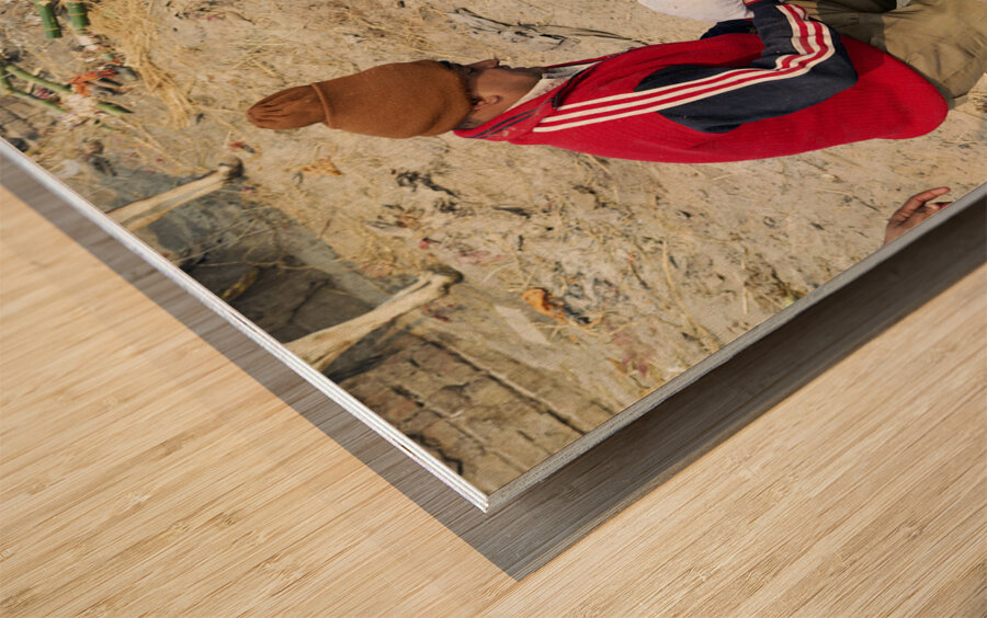 India. Varanasi Benares Uttar Pradesh. The sacred rite of hindu cremations by the river Ganges Wood print