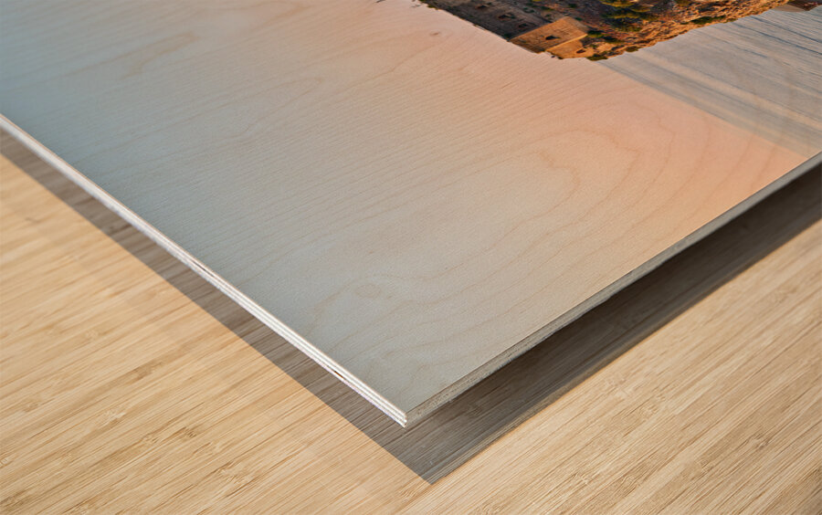 The city of Scilla Calabria Italy. Elevated view of the Ruffo castle at sunset Wood print