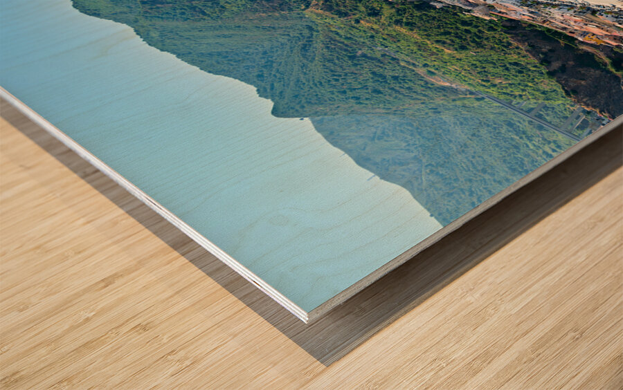 The city of Scilla Calabria Italy. Leisure time at Marina Grande beach in summer Wood print