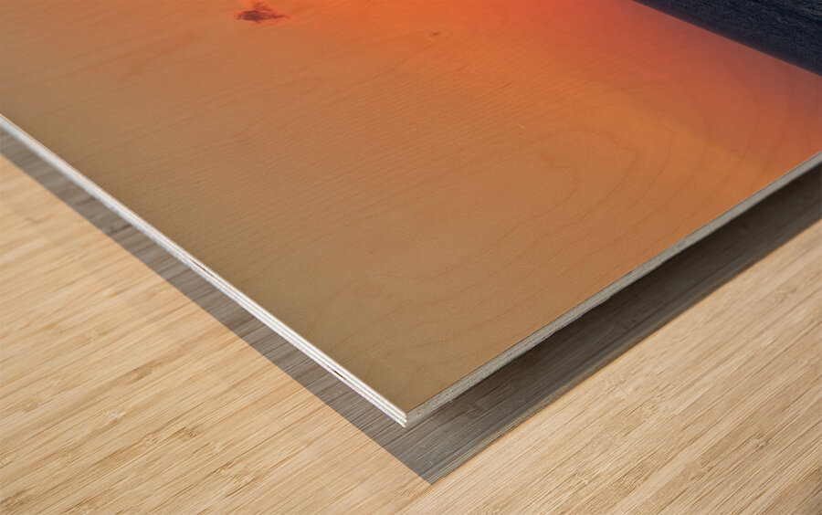 Tropea Calabria Italy. The sun sets in the crater mouth of Stromboli volcano Wood print