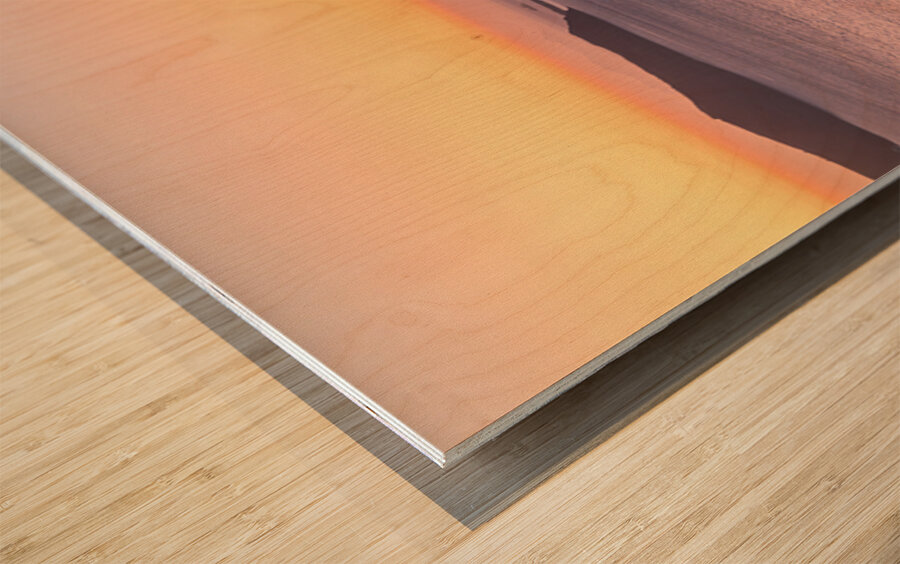 Sunset over Santorini caldera with church and boats. Wood print