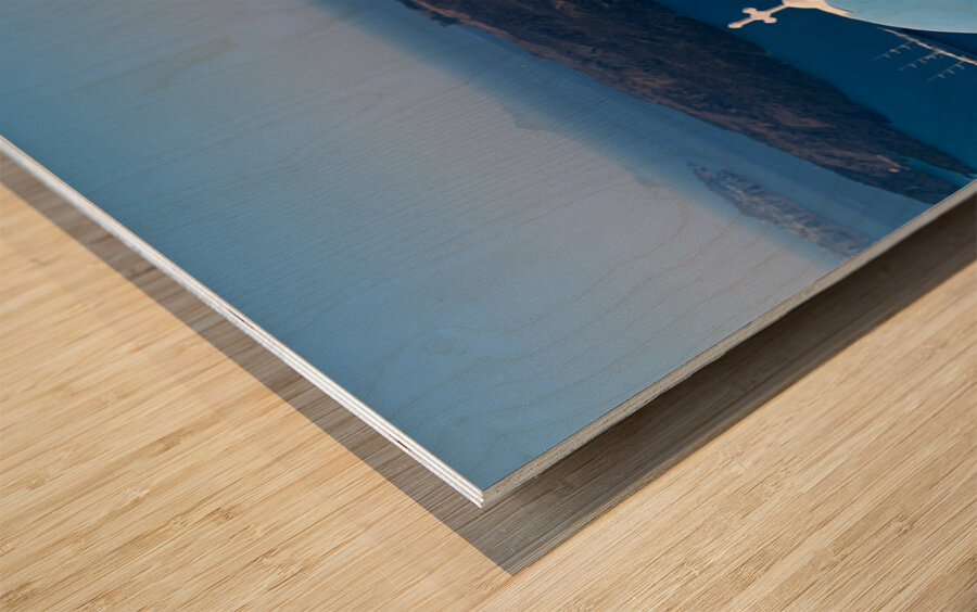 Santorinis iconic blue dome church and caldera seascape. Wood print