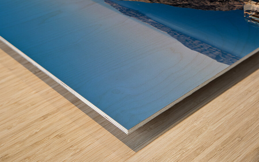 Santorinis white cliffside village and caldera view. Wood print