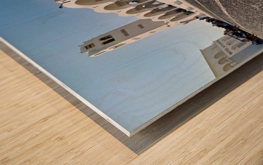 Beautiful white church and cobblestone street in sunny Santorini Wood print