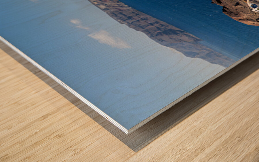 Iconic Santorini bell tower overlooking the caldera and Aegean S Wood print