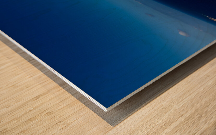 Santorinis iconic white architecture and windmill against the d Wood print