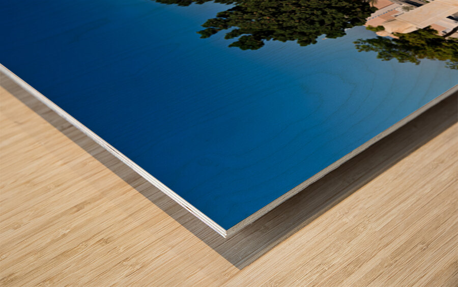 Traditional Greek church blue dome bell tower sunny day. Wood print