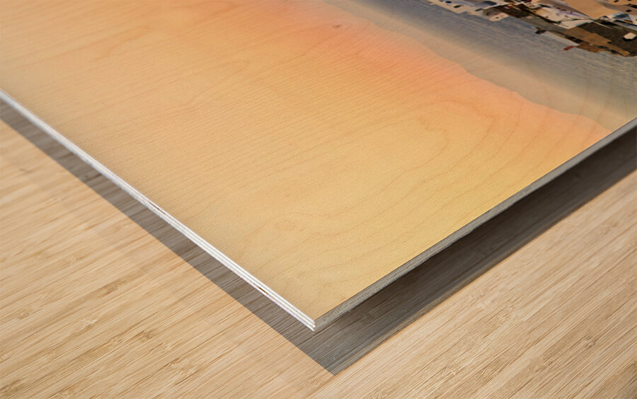 Whitewashed Santorini village and windmills at sunset over the s Wood print