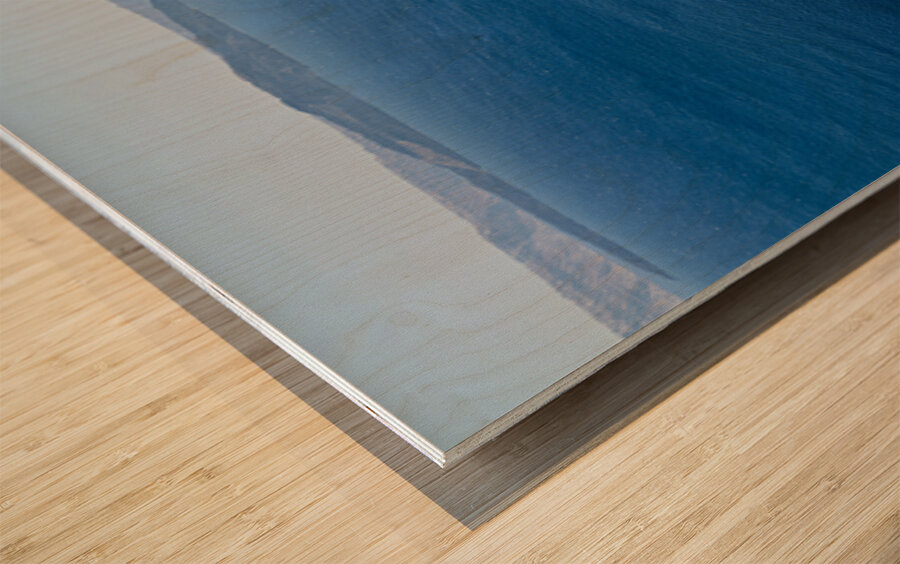 Santorinis blue domes and caldera view. Wood print