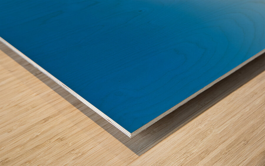 White bell tower against blue sky and sea. Wood print