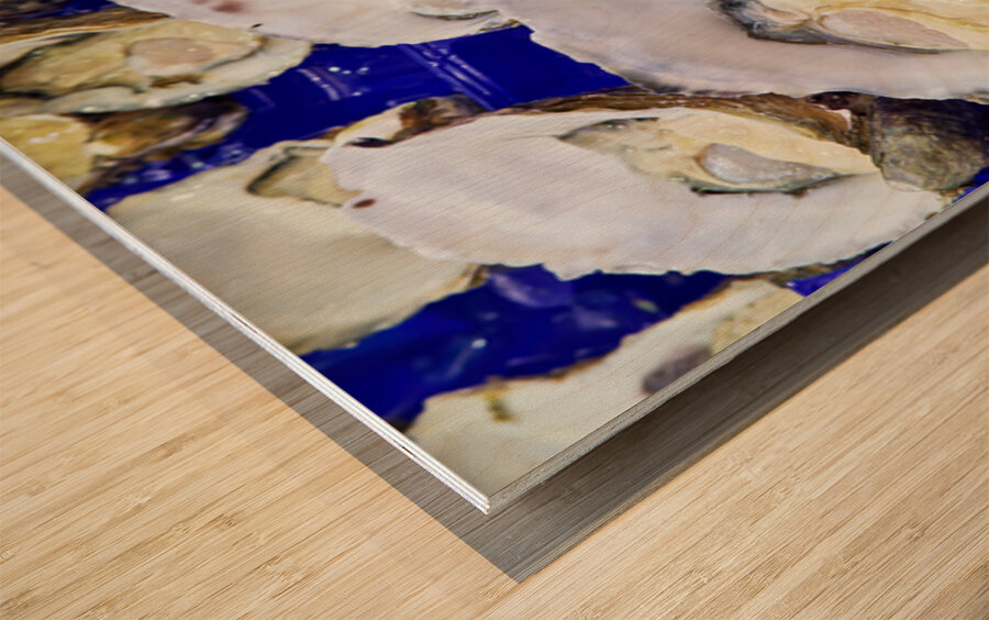 Freshly shucked oysters on blue plastic trays. Wood print