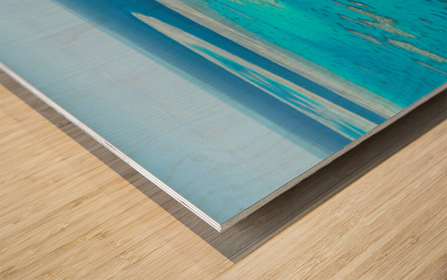 Aerial view of the Great Barrier Reefs turquoise waters. Wood print