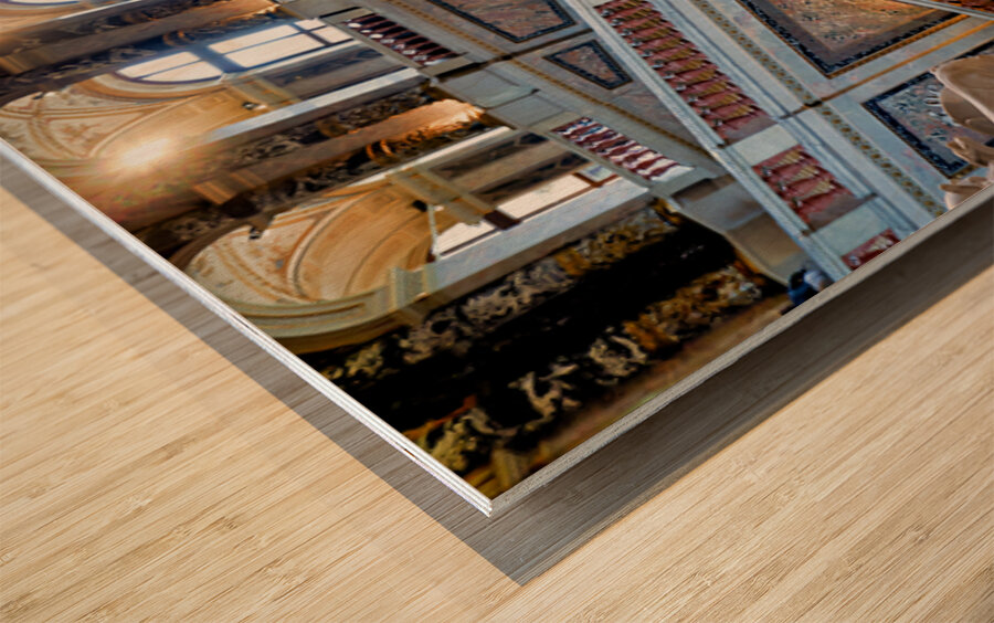 Ornate museum hall with statues grand staircase and visitor. Wood print