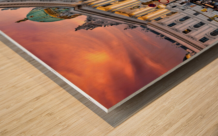 Hofburg Palace Vienna illuminated at dusk with festive street  Wood print