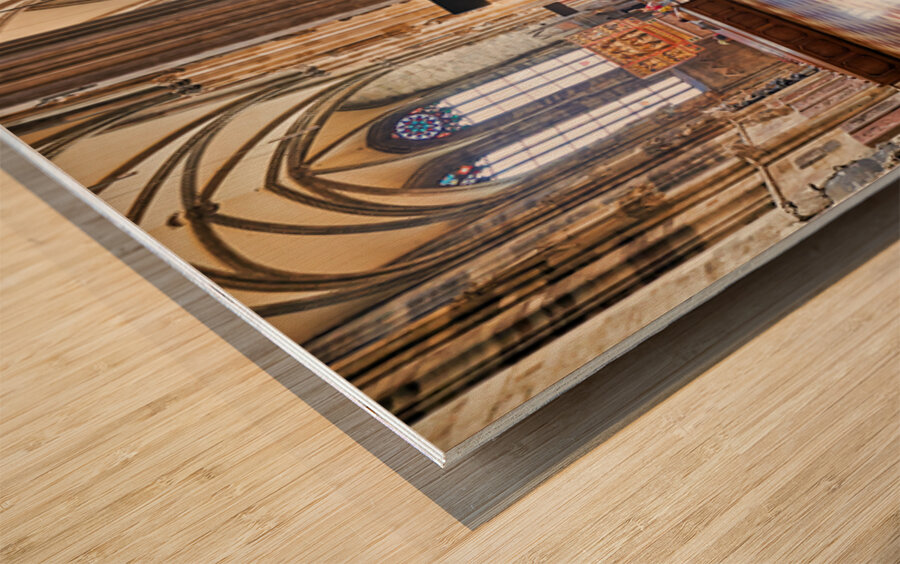 Grand cathedral interior with vaulted ceilings columns and cru Wood print