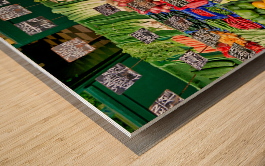 Colorful fresh vegetables and fruits displayed at a market stall Wood print