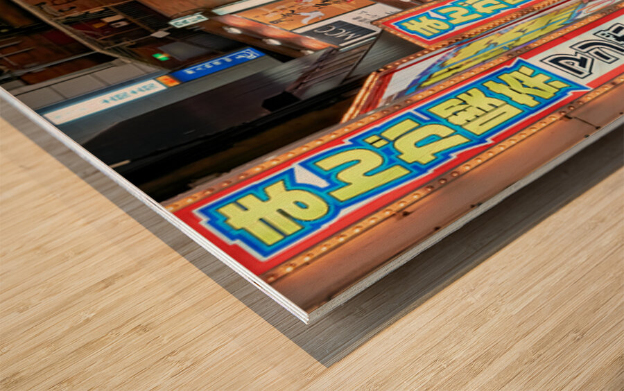 Nighttime crowd under neon lights in Shibuya district in Tokyo Wood print
