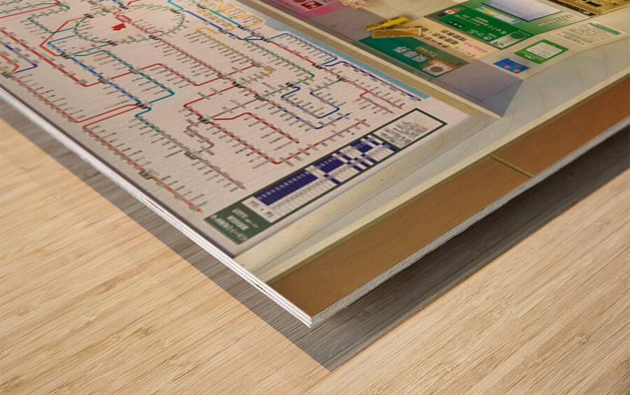 Buying tickets at a metro station in Tokyo Japan during the day Wood print