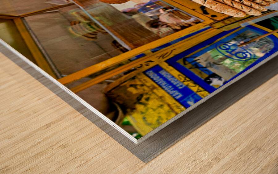 Food stall offers baked goods in downtown Athens Greece Wood print