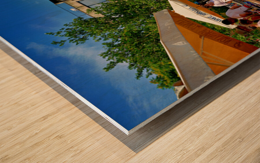 People walk around the bustling flea market at Monastiraki Wood print