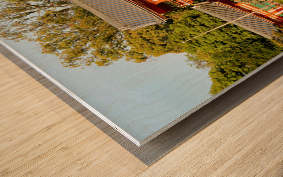 Kyoto Yasaka shrine temple with visitors and trees in background Wood print