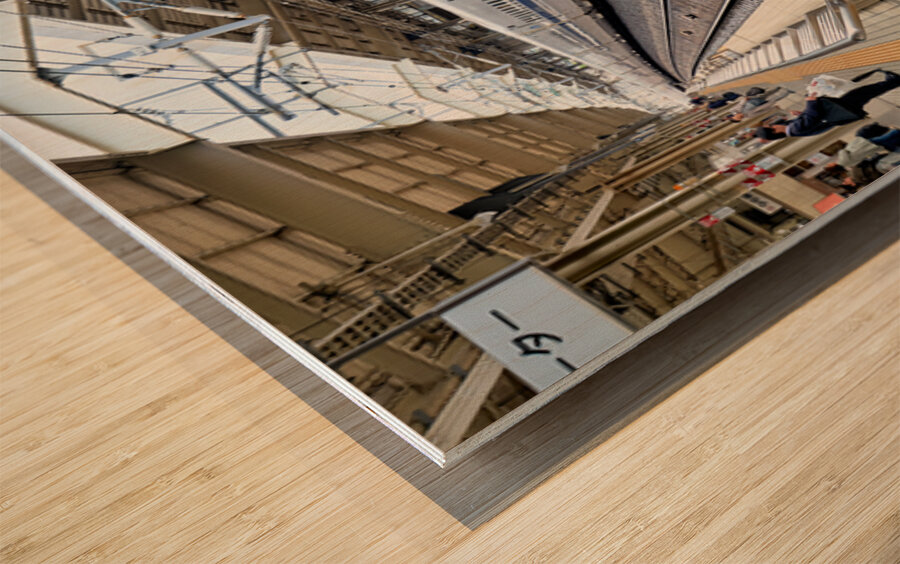 Shinkansen arrives at Kyoto Station in Japan during daylight Wood print