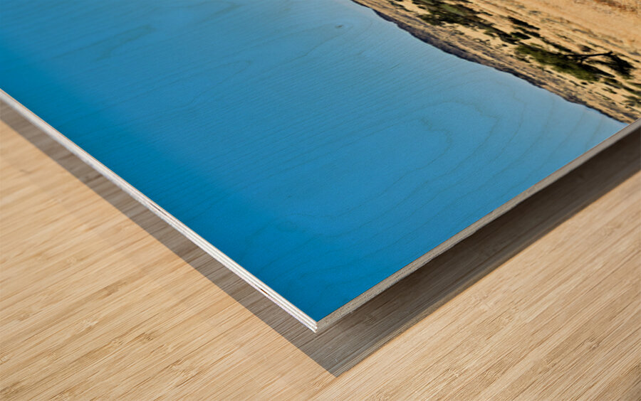 Granite peaks of Spizkoppe rise above the Namib Desert in Namibi Wood print