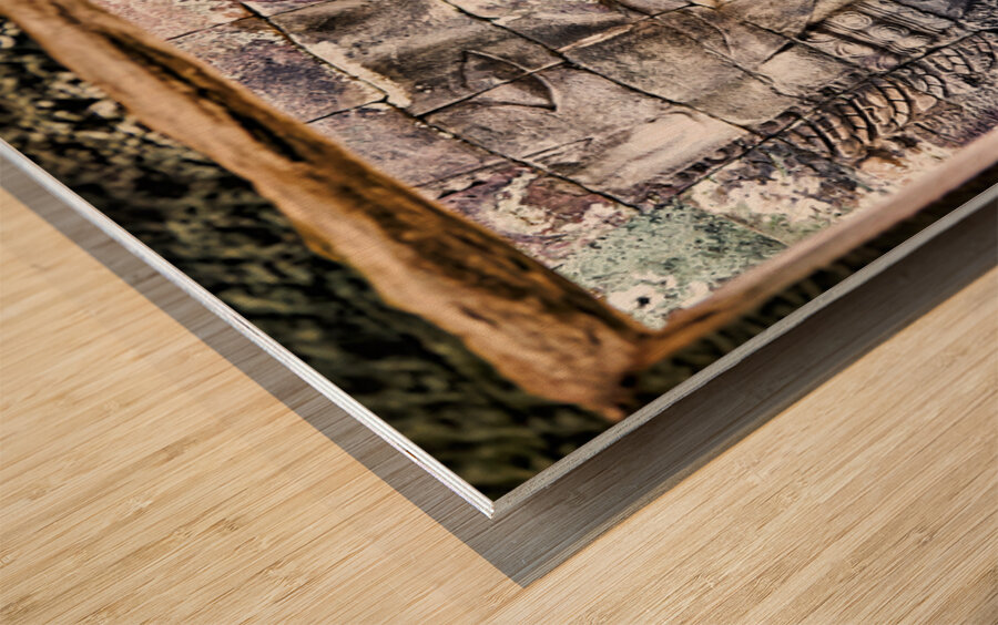 Ancient stone face carving framed in temple window. Wood print