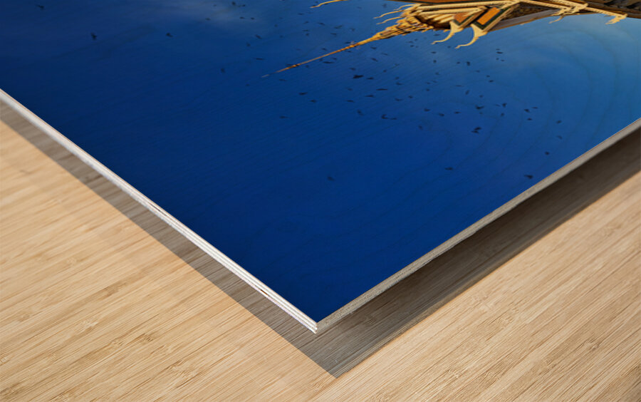 Majestic Cambodian temple under a blue sky with flying birds. Wood print